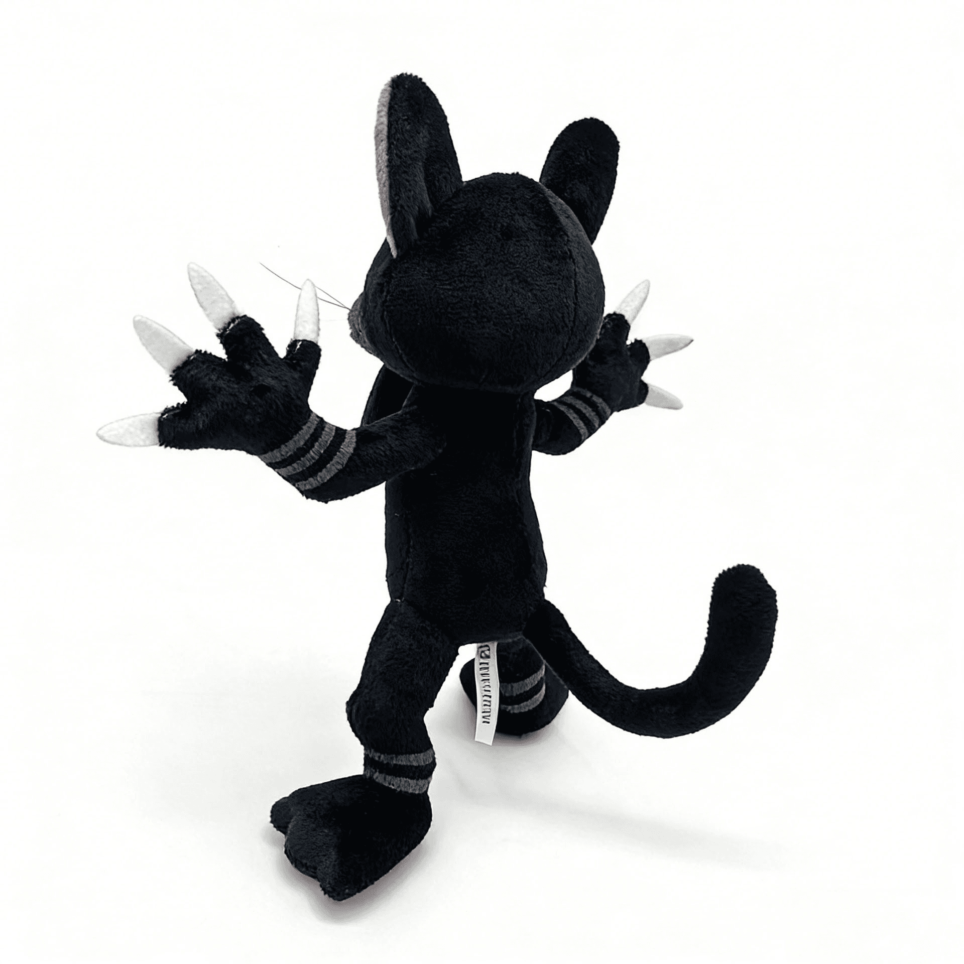 Side view of black cat character plush sample for structure refinement