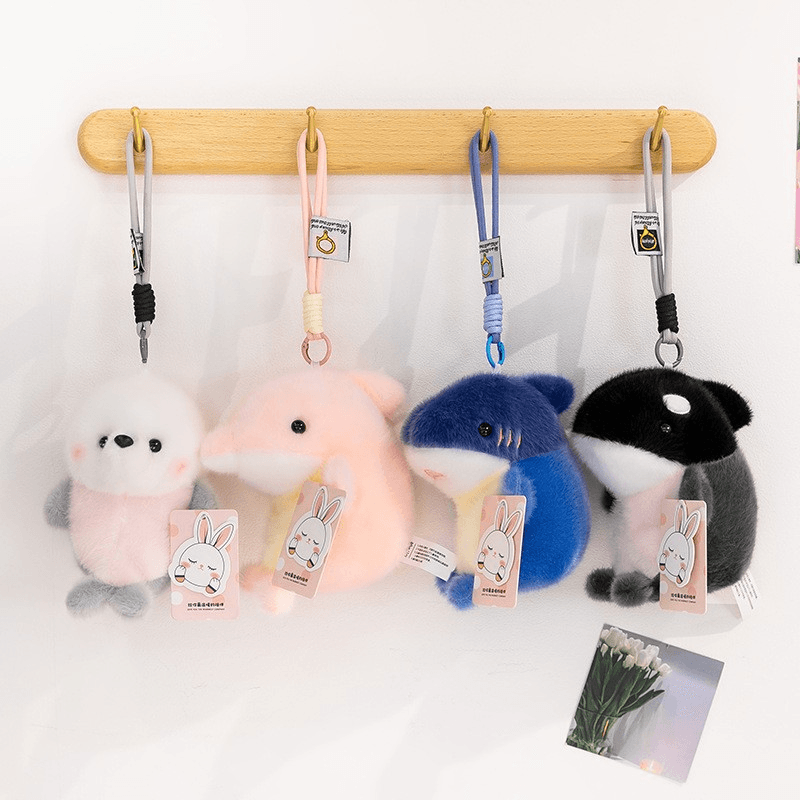 Custom aquarium character plush keychains developed by Giftora
