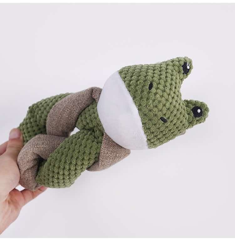 Textured animal plush toy shown against a light neutral background