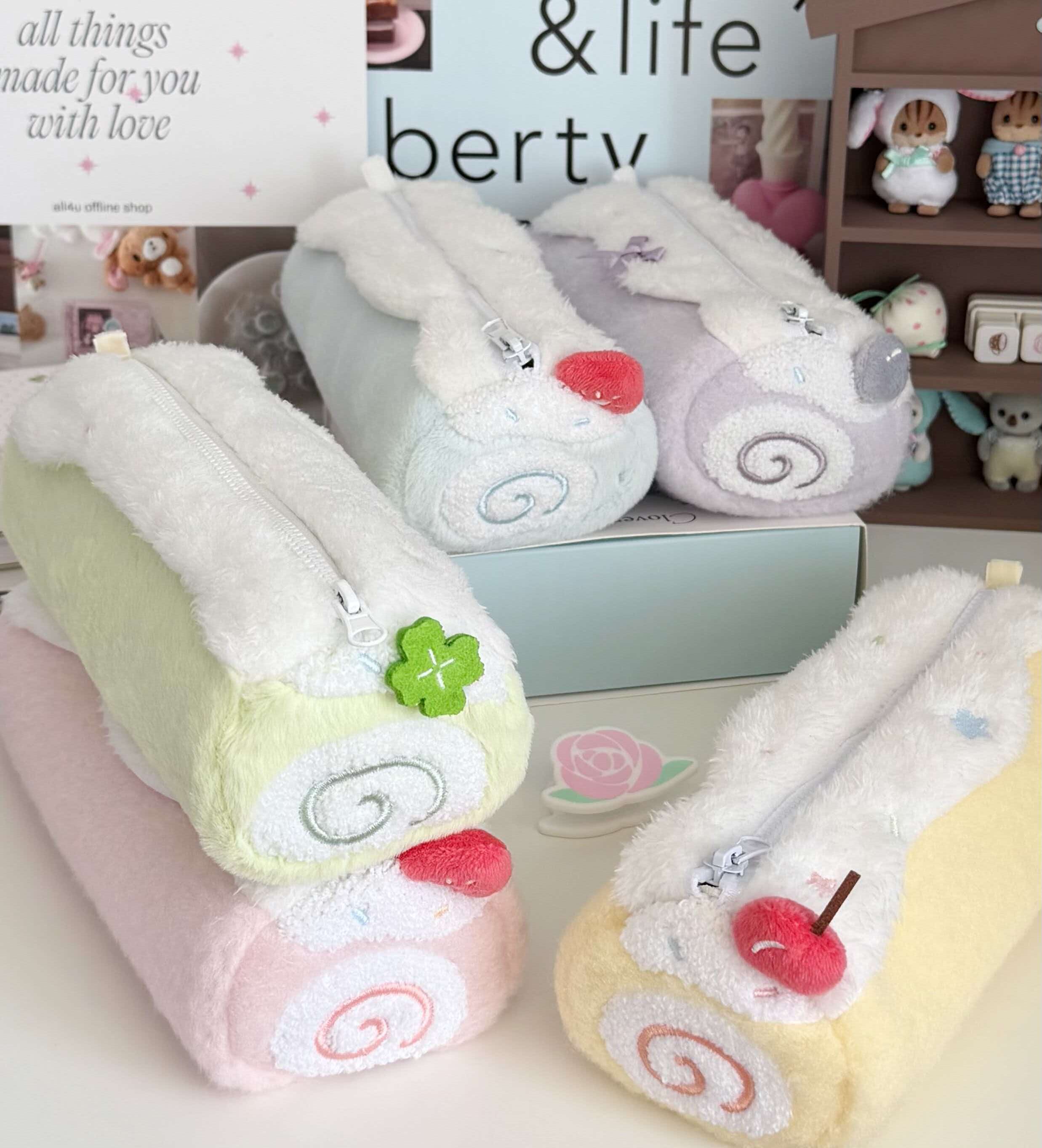 Collection of custom plush pencil cases shown as development examples